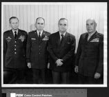 Leo Jenkins with military officers